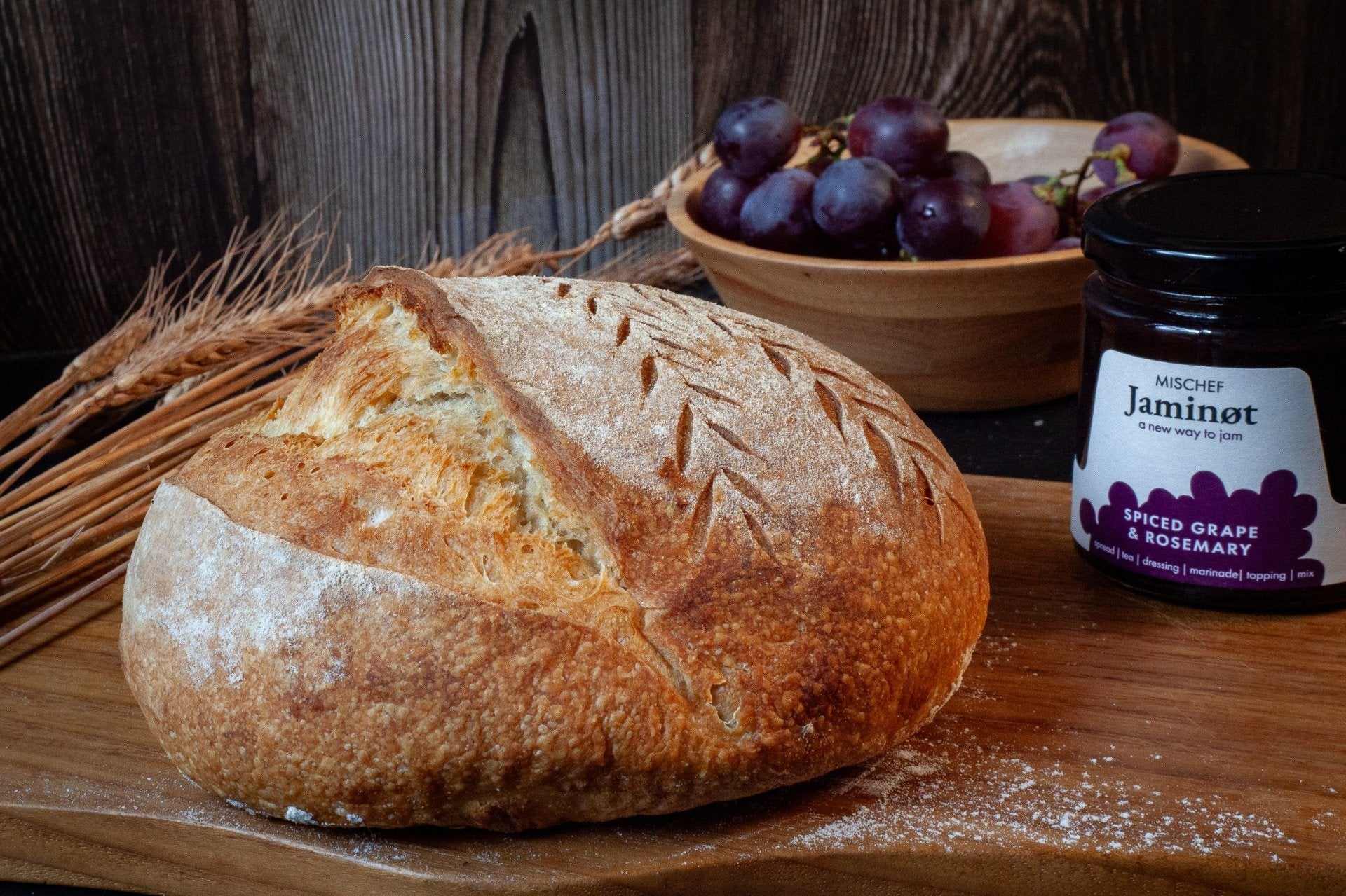 Artisan Country Sourdough Bread loaf on wooden board