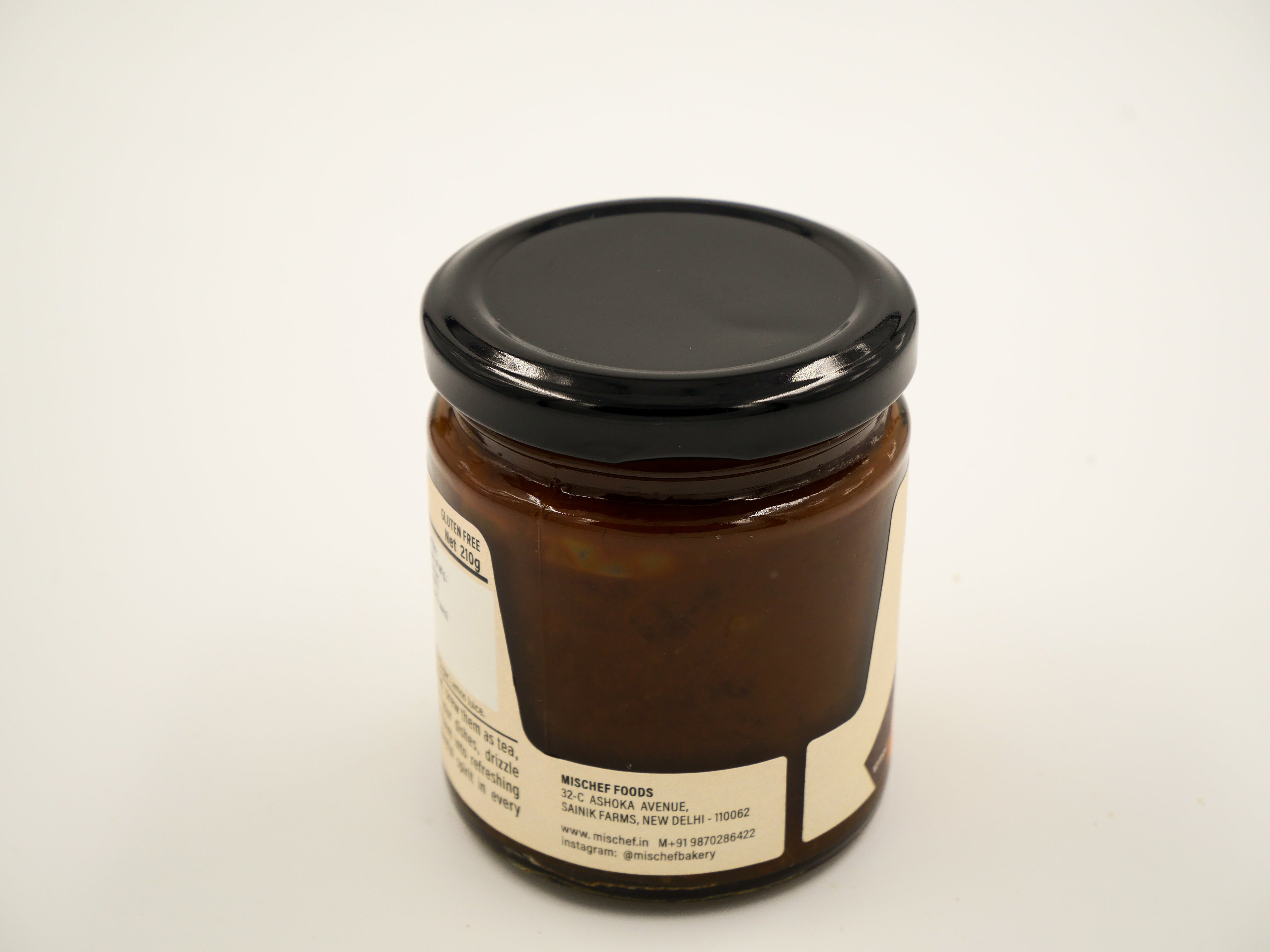 Layered chocolate-orange cookie with jam filling – artisan sweet snack