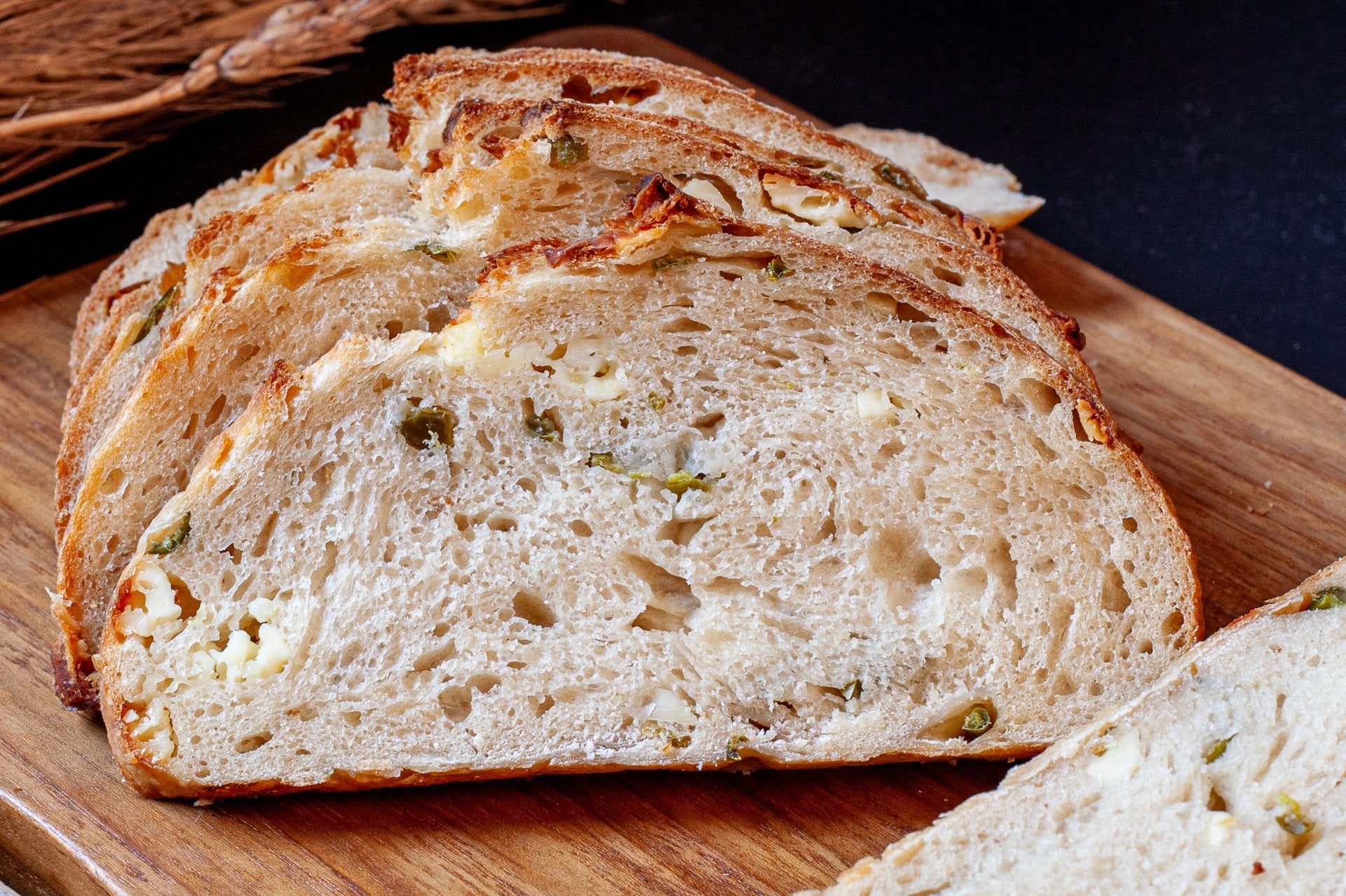 Freshly baked Jalapeño Cheddar Sourdough, perfect for adding a kick to your meals.