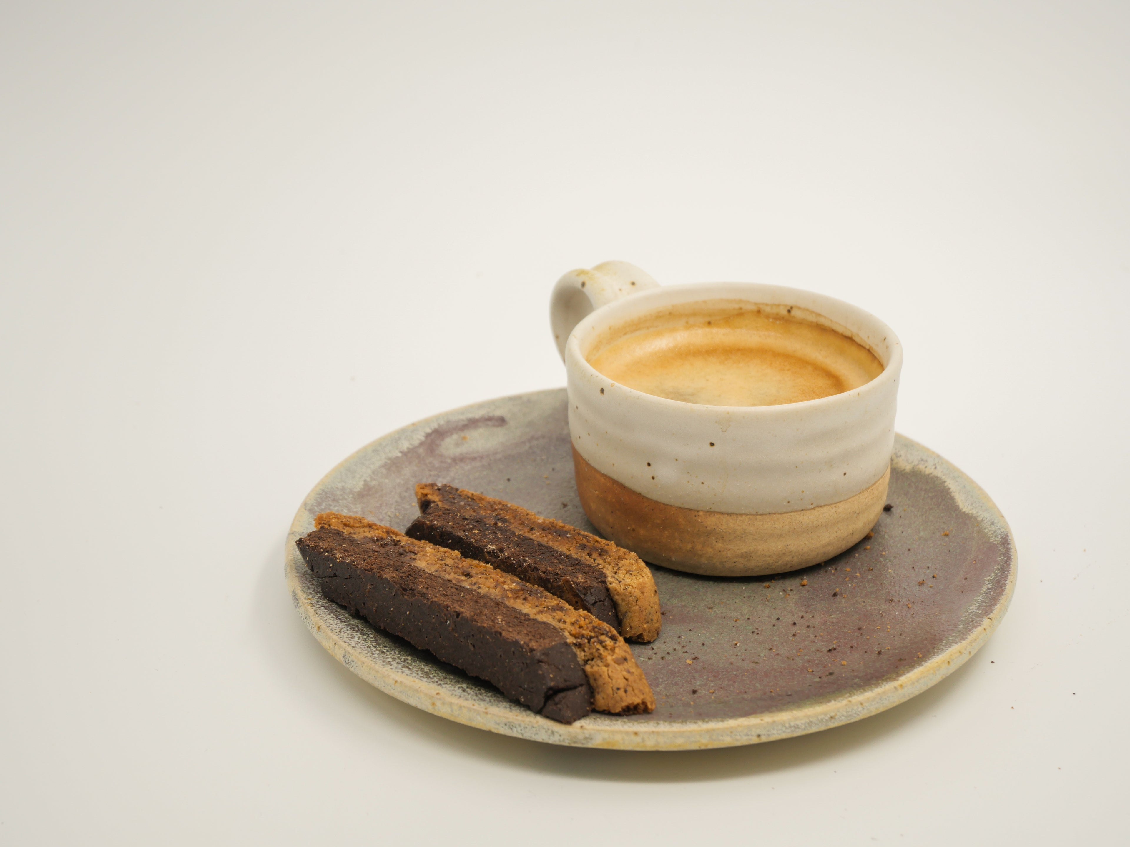 Handcrafted Coffee Chocolate Cardamom Biscotti with a crisp texture and a blend of coffee, chocolate, and cardamom spices.