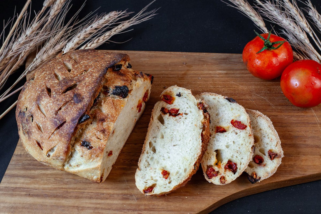 Close-up of Sun-dried Tomato and Truffle Oil Sourdough highlighting its rich, savory ingredients.